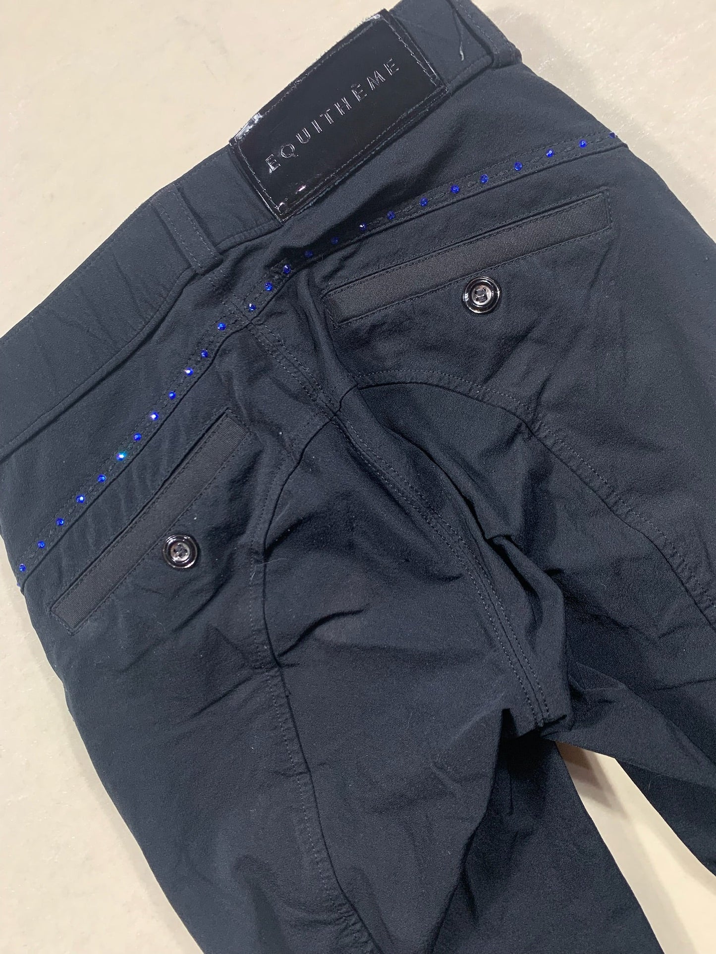 Pantalon Equithème Safari – Noir avec strass bleus – Taille 12 ans
