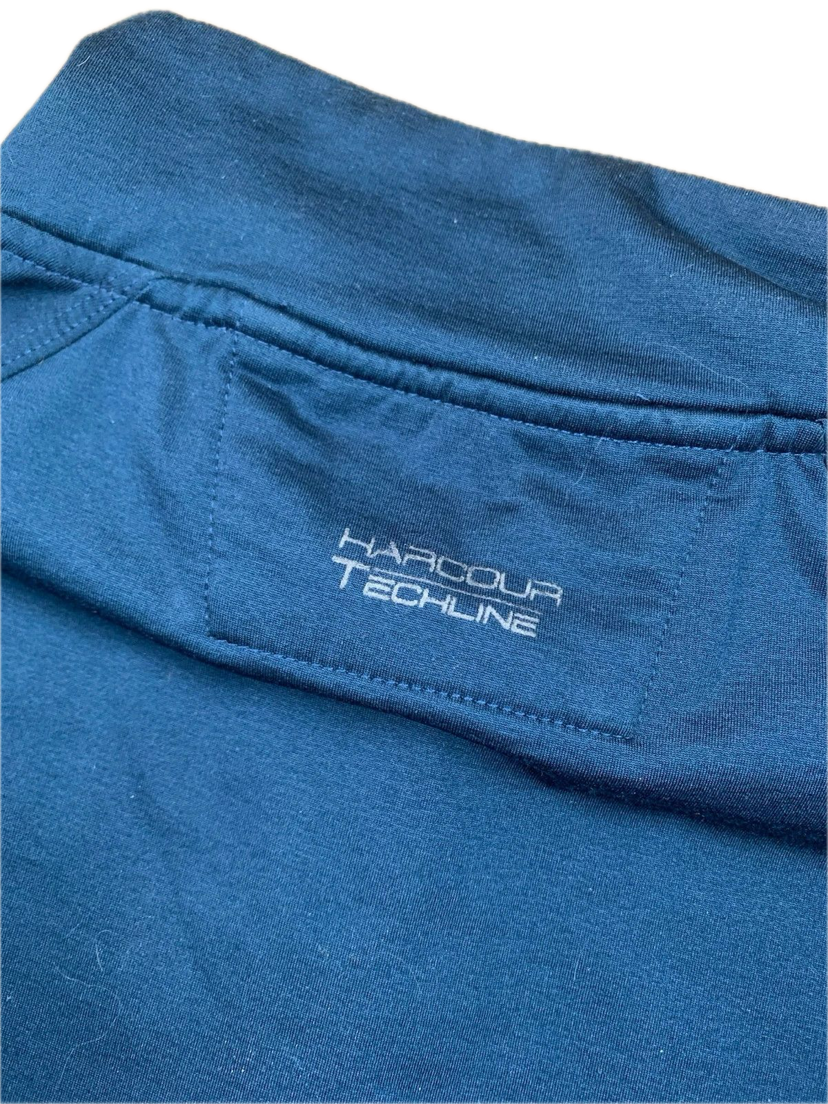 Polo Technique Harcour Manches Longues Bleu : Performance & Style